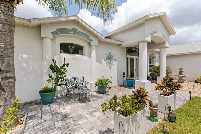 42 Buffalo Bill Dr, Palm Coast, FL 32137 - view of patio / terrace featuring french doors