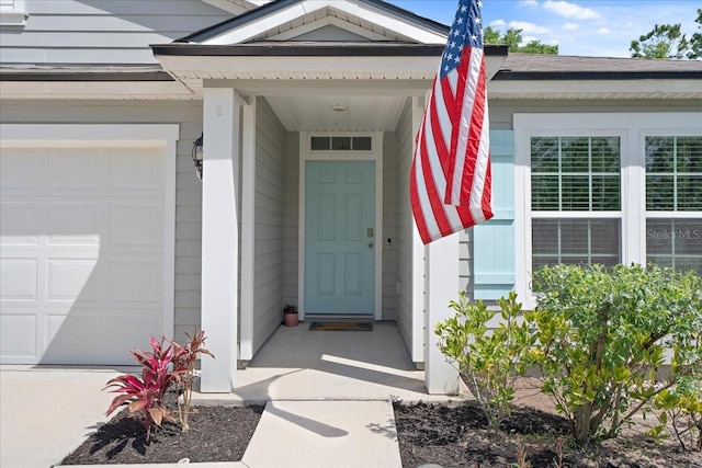619 Grand Reserve Dr, Bunnell, FL 32110 - view of exterior entry featuring an attached garage