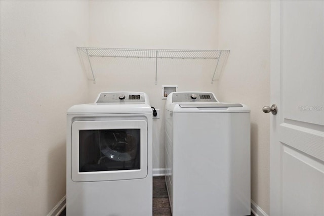 619 Grand Reserve Dr, Bunnell, FL 32110 - laundry room with baseboards, separate washer and dryer, and laundry area