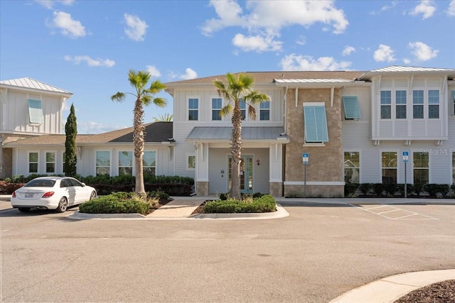 619 Grand Reserve Dr, Bunnell, FL 32110 - townhome / multi-family property featuring uncovered parking