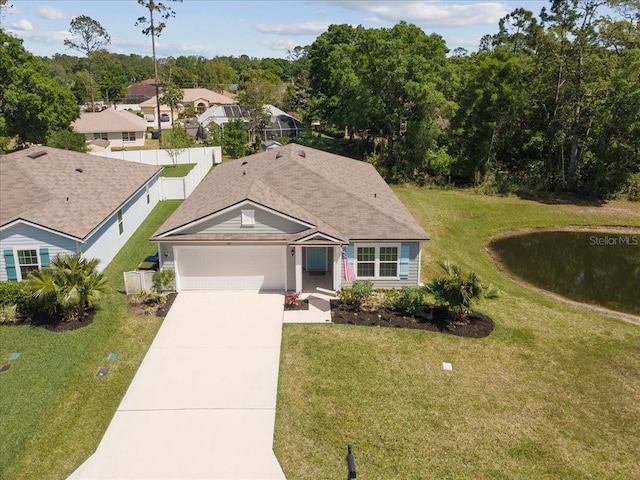 619 Grand Reserve Dr, Bunnell, FL 32110 - view of front facade featuring a residential view, a garage, driveway, and a front lawn