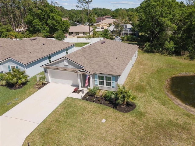 619 Grand Reserve Dr, Bunnell, FL 32110 - exterior space featuring a garage, a residential view, a front lawn, and concrete driveway