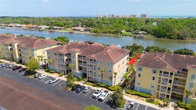 drone / aerial view featuring a water view