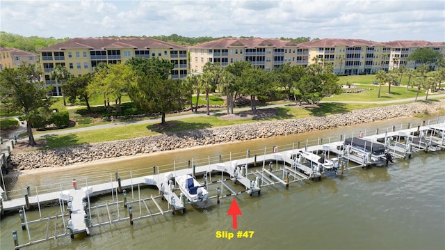 dock area featuring a water view and boat lift