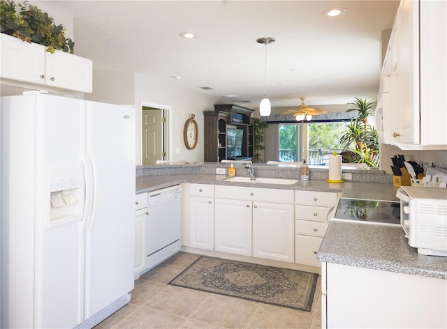 kitchen with white cabinetry, ceiling fan, a sink, and white appliances