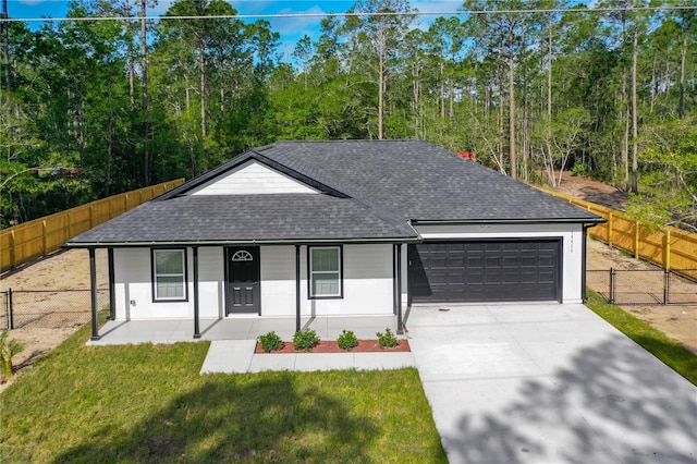 10625 Amos Ave, Hastings, FL 32145 - single story home with a shingled roof, a garage, fence, a front lawn, and driveway