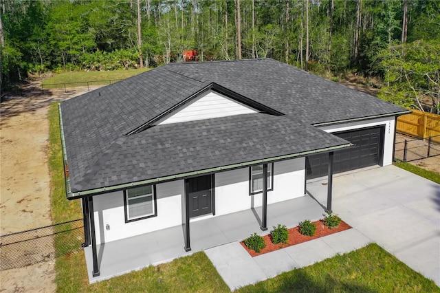 10625 Amos Ave, Hastings, FL 32145 - exterior space with fence, a garage, and concrete driveway