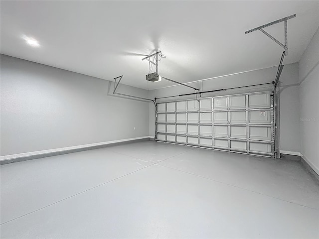10625 Amos Ave, Hastings, FL 32145 - garage with baseboards and a garage door opener