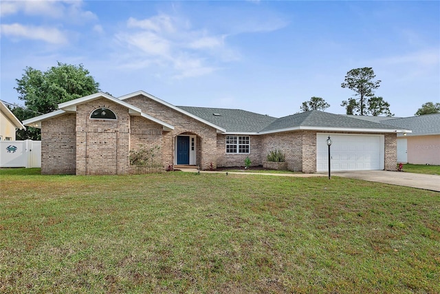 75 Fortune Ln, Palm Coast, FL 32137 - ranch-style home with concrete driveway, an attached garage, and brick siding