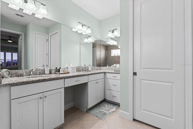540 Good Life Way, Daytona Beach, FL 32124 - bathroom with double vanity and tile patterned floors