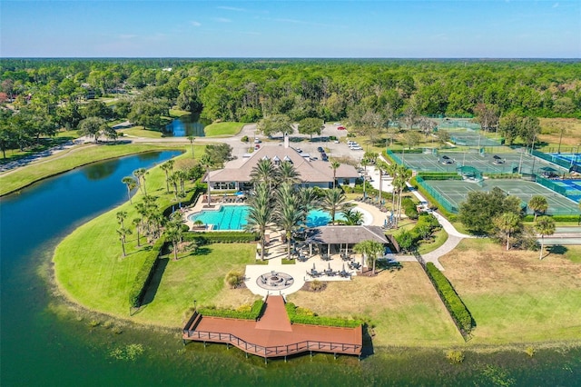 aerial view featuring a water view and a wooded view