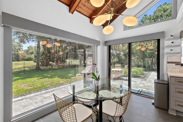 sunroom with beam ceiling