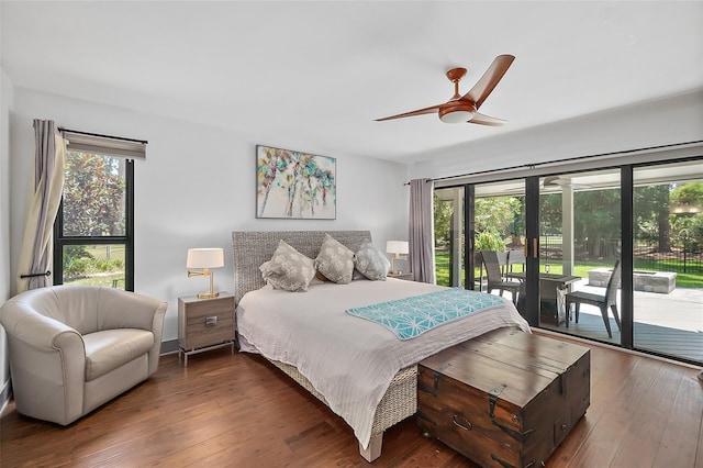 bedroom with hardwood / wood-style floors, access to exterior, and a ceiling fan
