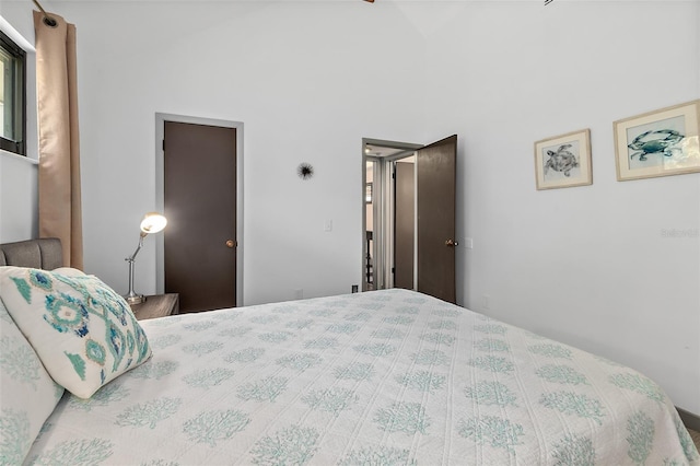 bedroom featuring vaulted ceiling