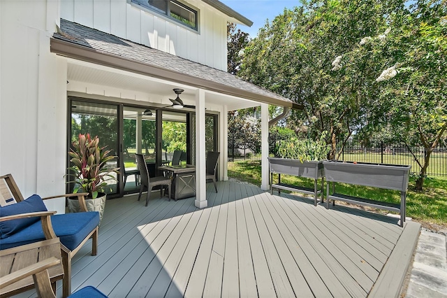 wooden deck featuring fence
