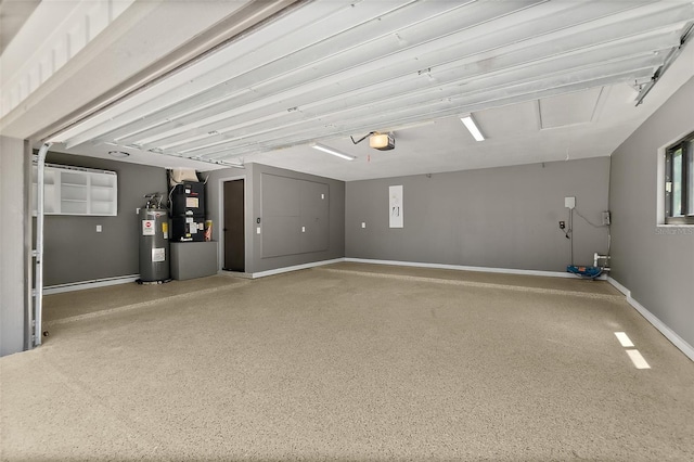garage featuring water heater, baseboards, heating unit, and a garage door opener
