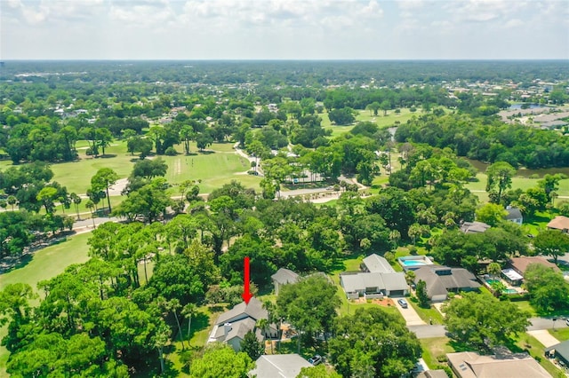 aerial view with view of golf course and a residential view