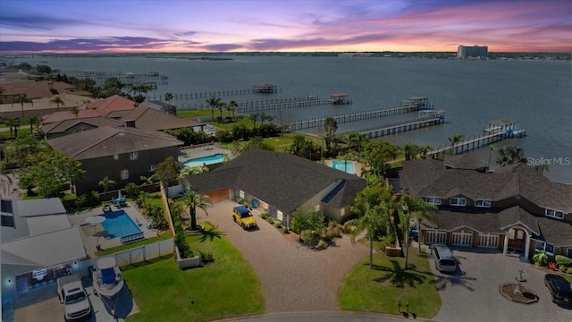 2924 River Point Dr, Daytona Beach, FL 32118 - aerial view at dusk featuring a water view
