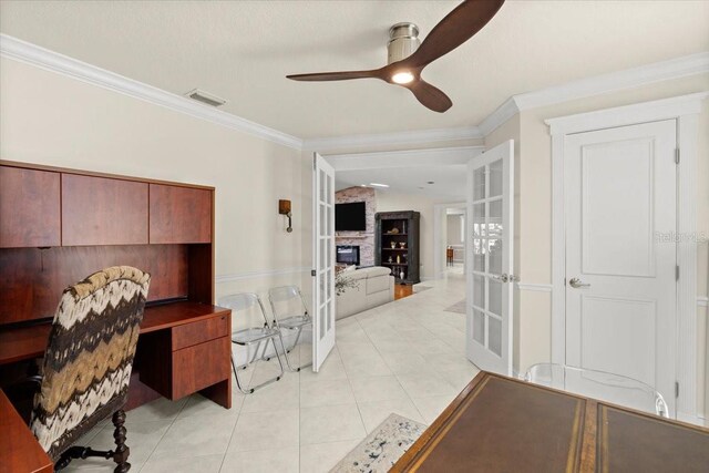 2924 River Point Dr, Daytona Beach, FL 32118 - office area featuring ornamental molding, french doors, ceiling fan, and light tile patterned floors