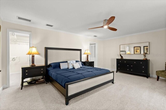 2924 River Point Dr, Daytona Beach, FL 32118 - bedroom featuring crown molding, visible vents, and carpet flooring