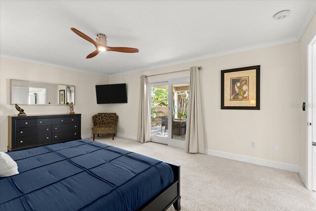 2924 River Point Dr, Daytona Beach, FL 32118 - bedroom with crown molding, baseboards, access to outside, and carpet flooring