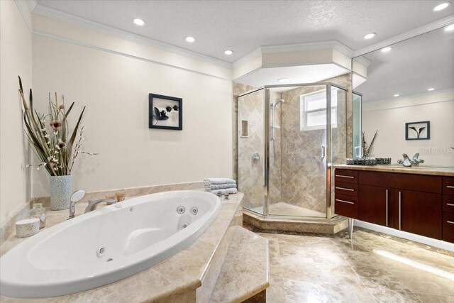 2924 River Point Dr, Daytona Beach, FL 32118 - bathroom featuring ornamental molding, a tub with jets, recessed lighting, vanity, and a stall shower