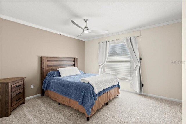 2924 River Point Dr, Daytona Beach, FL 32118 - bedroom featuring crown molding, baseboards, and light carpet