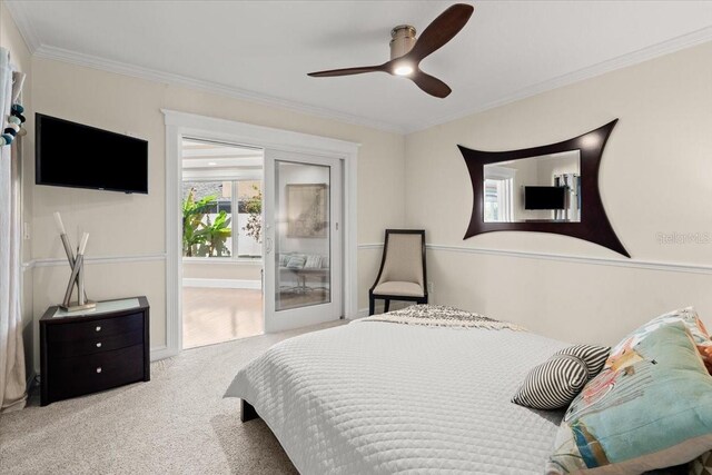 2924 River Point Dr, Daytona Beach, FL 32118 - carpeted bedroom with crown molding, ceiling fan, and access to outside