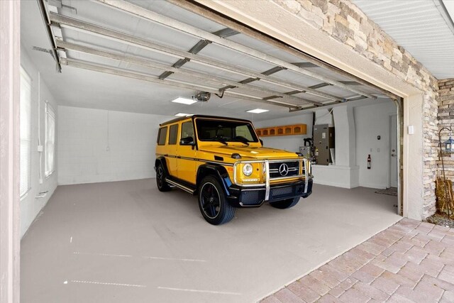 2924 River Point Dr, Daytona Beach, FL 32118 - garage featuring a garage door opener