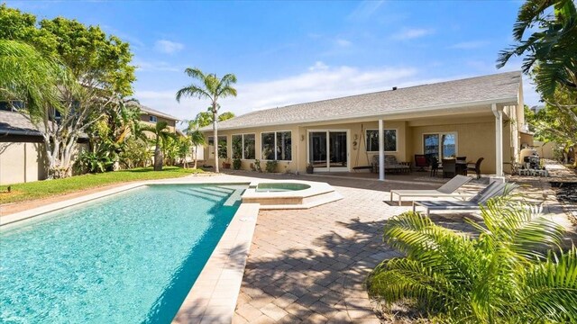 2924 River Point Dr, Daytona Beach, FL 32118 - view of swimming pool with a patio area and a pool with connected hot tub