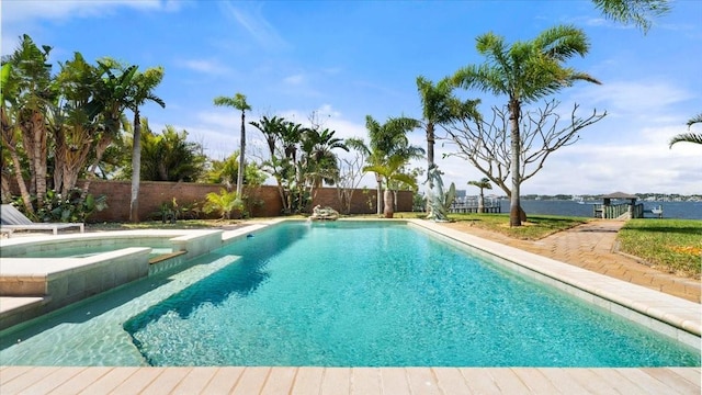 2924 River Point Dr, Daytona Beach, FL 32118 - view of pool featuring a pool with connected hot tub and a fenced backyard