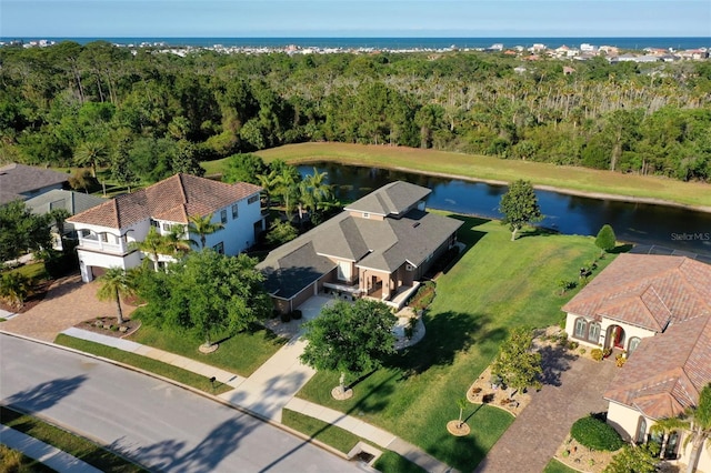 65 Heron Dr, Palm Coast, FL 32137 - aerial view featuring a water view and a forest view