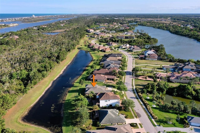 65 Heron Dr, Palm Coast, FL 32137 - aerial view featuring a water view and a residential view
