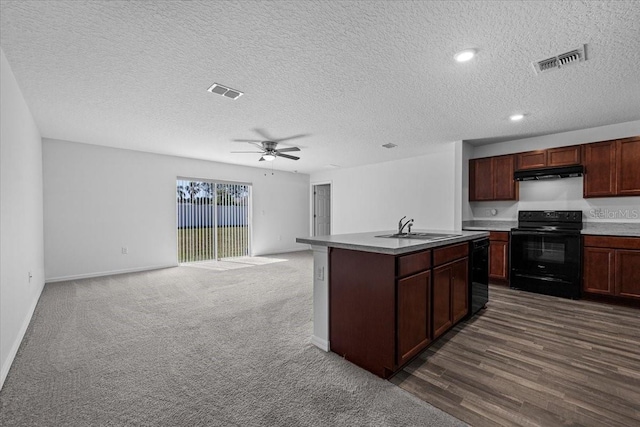 10 Post Oak Ln, Palm Coast, FL 32164 - kitchen featuring black appliances, under cabinet range hood, a sink, a ceiling fan, and open floor plan