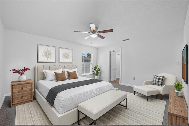 10 Post Oak Ln, Palm Coast, FL 32164 - carpeted bedroom with baseboards and a ceiling fan