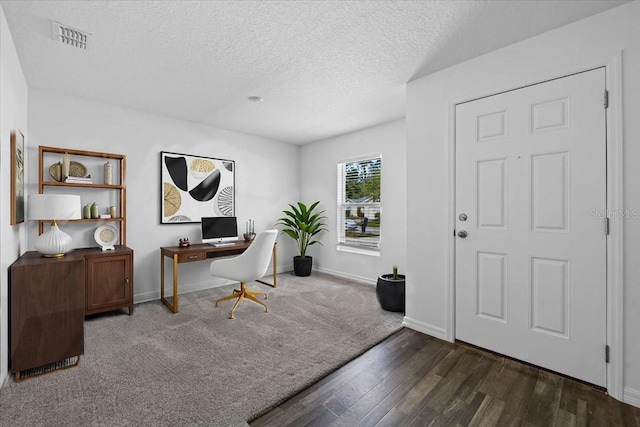 10 Post Oak Ln, Palm Coast, FL 32164 - office featuring wood finished floors, a textured ceiling, and baseboards