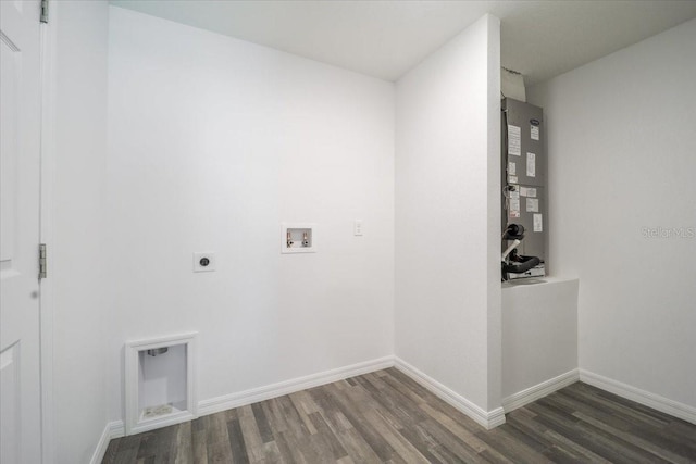 10 Post Oak Ln, Palm Coast, FL 32164 - washroom featuring electric dryer hookup, wood finished floors, hookup for a washing machine, and baseboards
