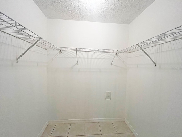 3 Frank Pl, Palm Coast, FL 32137 - spacious closet featuring light tile patterned flooring
