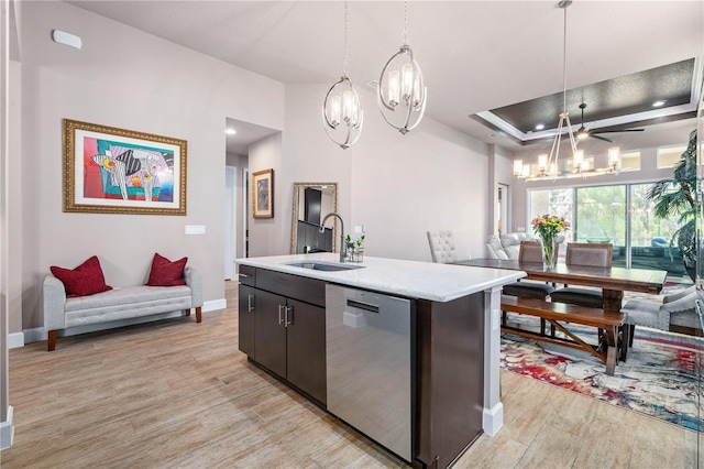 816 Creekwood Dr, Ormond Beach, FL 32174 - kitchen with open floor plan, stainless steel dishwasher, a sink, and a chandelier