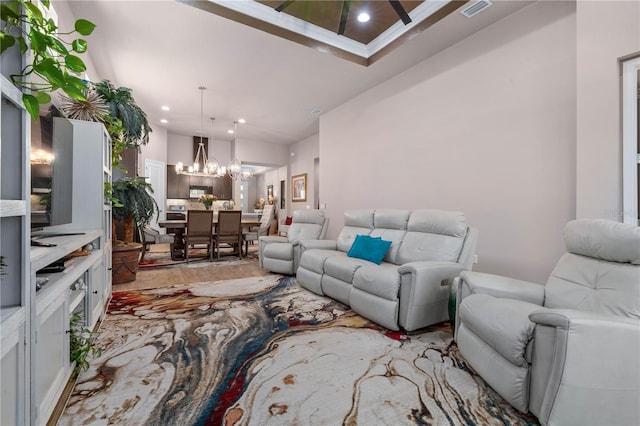 816 Creekwood Dr, Ormond Beach, FL 32174 - living area with visible vents, recessed lighting, and a notable chandelier