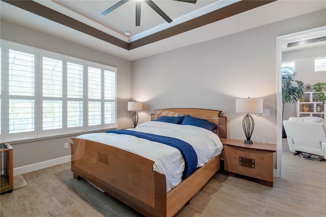 816 Creekwood Dr, Ormond Beach, FL 32174 - bedroom with light wood finished floors, crown molding, and multiple windows