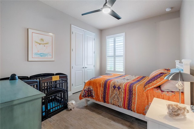 816 Creekwood Dr, Ormond Beach, FL 32174 - bedroom with wood finished floors, a closet, and ceiling fan