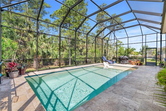 816 Creekwood Dr, Ormond Beach, FL 32174 - pool featuring grilling area, a patio area, and glass enclosure