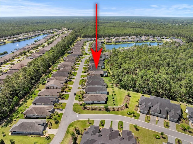 816 Creekwood Dr, Ormond Beach, FL 32174 - aerial view featuring a view of trees, a residential view, and a water view