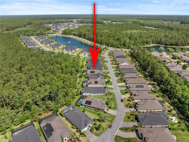 816 Creekwood Dr, Ormond Beach, FL 32174 - bird's eye view featuring a forest view, a water view, and a residential view