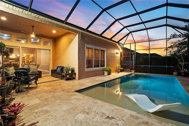 816 Creekwood Dr, Ormond Beach, FL 32174 - pool at dusk featuring a patio area, outdoor lounge area, an outdoor pool, and glass enclosure