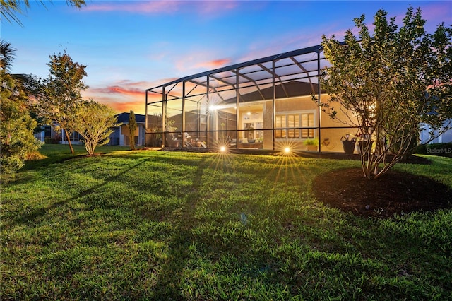 816 Creekwood Dr, Ormond Beach, FL 32174 - yard at dusk with glass enclosure