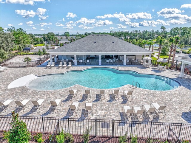 1665 Lake Reserve Dr, Deland, FL 32724 - community pool featuring a patio
