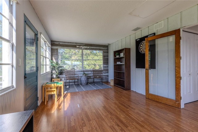 sunroom / solarium with visible vents