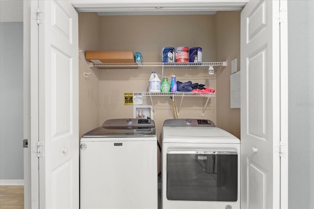 laundry area with washer and dryer